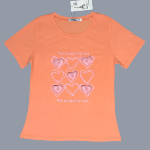 Blusa tipo playera de algodón con diseño de corazones tridimensionales en color naranja claro